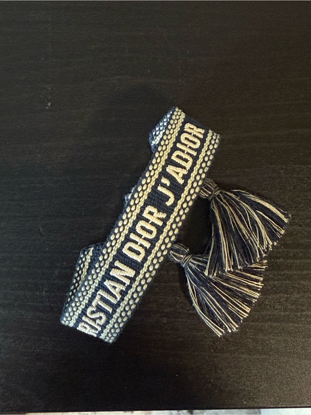 Navy and Cream Woven Logo Tassel Bracelet - Picture 3 of 3